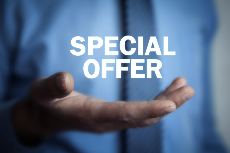Businessman holding Special Offer text. Business concept